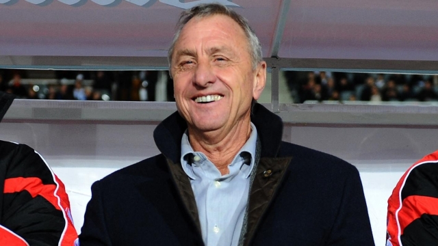 Catalonia's coach and former football star Johan Cruyff smiles as he attends a friendly football match between Catalonia National Team and Honduras National Team at Lluis Companys Olympic stadium in Barcelona, on December 28, 2010. AFP PHOTO/LLUIS GENE (Photo by LLUIS GENE / AFP)