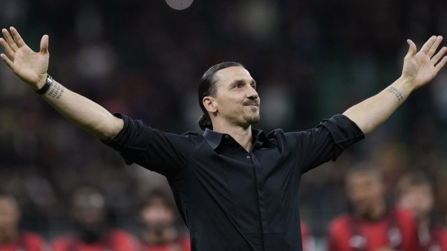 FILE - AC Milan's Zlatan Ibrahimovic reacts after his last game for the club at the end of a Serie A soccer match between AC Milan and Hellas Verona at the San Siro stadium, in Milan, Italy, Sunday, June 4, 2023. A beleaguered AC Milan could be set to call on its talismanic Swede yet again. Zlatan Ibrahimovic officially retired at the end of last season with an emotional speech at San Siro that left many in tears. But during a difficult October Milan has reportedly been in constant contact with the 42-year-old about a potential third spell at the club in an off-the-field capacity. (AP Photo/Antonio Calanni, File)