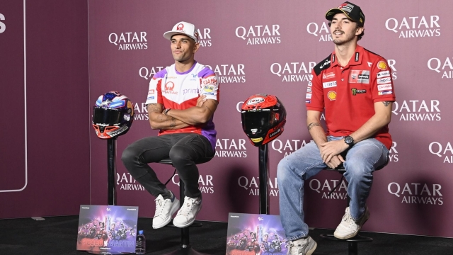 DOHA, QATAR - NOVEMBER 16: Jorge Martin of Spain and Pramac Racing  (L) and Francesco Bagnaia of Italy and Ducati Lenovo Team look on during the press conference pre event during the MotoGP of Qatar - Previews at Losail Circuit on November 16, 2023 in Doha, Qatar. (Photo by Mirco Lazzari gp/Getty Images)