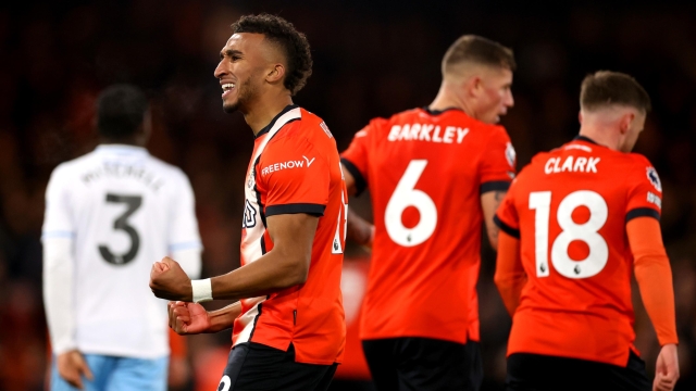 LUTON, ENGLAND - NOVEMBER 25: Jacob Brown of Luton Town celebrates after scoring the team's second goal during the Premier League match between Luton Town and Crystal Palace at Kenilworth Road on November 25, 2023 in Luton, England. (Photo by Julian Finney/Getty Images)