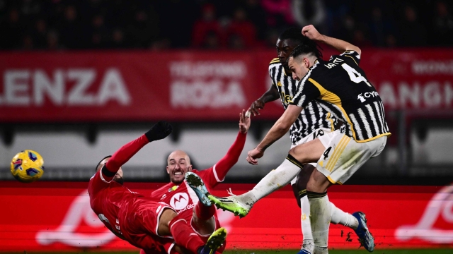 Juventus' Italian defender #04 Federico Gatti scores the team's second goal during the Italian Serie A football match between AC Monza and Juventus at the Bianteo stadium in Monza on December 01, 2023. (Photo by Marco BERTORELLO / AFP)