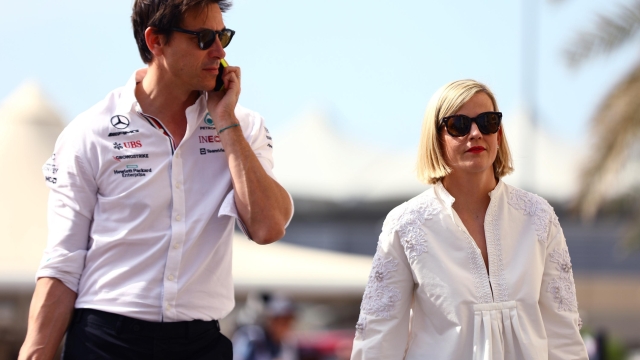 ABU DHABI, UNITED ARAB EMIRATES - NOVEMBER 20: Mercedes GP Executive Director Toto Wolff and Susie Wolff walk in the Paddock prior to the F1 Grand Prix of Abu Dhabi at Yas Marina Circuit on November 20, 2022 in Abu Dhabi, United Arab Emirates. (Photo by Mark Thompson/Getty Images)
