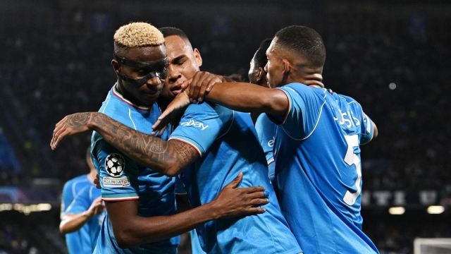 NAPLES, ITALY - DECEMBER 12: Victor Osimhen of SSC Napoli celebrates with teammates after scoring their team's second goal during the UEFA Champions League match between SCC Napoli and SC Braga at Stadio Diego Armando Maradona on December 12, 2023 in Naples, Italy. (Photo by Francesco Pecoraro/Getty Images)