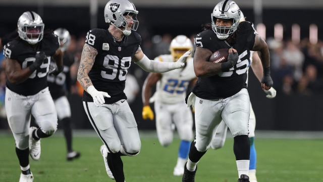 LAS VEGAS, NEVADA - DECEMBER 14: Defensive tackle John Jenkins #95 of the Las Vegas Raiders scores a touchdown against the Los Angeles Chargers during the third quarter at Allegiant Stadium on December 14, 2023 in Las Vegas, Nevada.   Sean M. Haffey/Getty Images/AFP (Photo by Sean M. Haffey / GETTY IMAGES NORTH AMERICA / Getty Images via AFP)