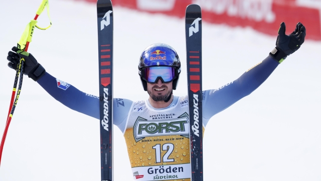VAL GARDENA, ITALY - DECEMBER 16: Dominik Paris of Team Italy celebrates during the Audi FIS Alpine Ski World Cup Men's Downhill on December 16, 2023 in Val Gardena, Italy. (Photo by Alexis Boichard/Agence Zoom/Getty Images)