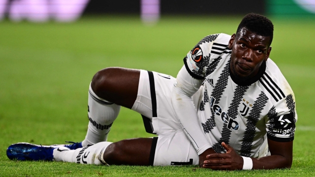 (FILES) Juventus' French midfielder Paul Pogba reacts after being tackled during the UEFA Europa League semi-final first leg football match between Juventus and Sevilla on May 11, 2023 at the Juventus stadium in Turin. France's World Cup winner Paul Pogba is facing the possibility of a lengthy ban after Italy's national anti-doping tribunal called for a four-year suspension for the Juventus midfielder, a club source told AFP on December 7, 2023. (Photo by Marco BERTORELLO / AFP)