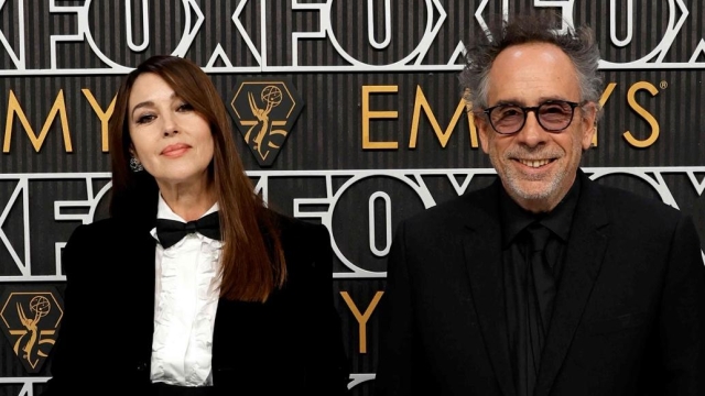 LOS ANGELES, CALIFORNIA - JANUARY 15: (L-R) Monica Bellucci and Tim Burton attend the 75th Primetime Emmy Awards at Peacock Theater on January 15, 2024 in Los Angeles, California.   Frazer Harrison/Getty Images/AFP (Photo by Frazer Harrison / GETTY IMAGES NORTH AMERICA / Getty Images via AFP)