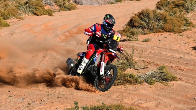Monster Energy Honda Team's US biker Ricky Brabec competes during stage 9 of of the Dakar rally 2024 between Hail and Al-Ula, Saudi Arabia, on January 16, 2024. (Photo by PATRICK HERTZOG / AFP)