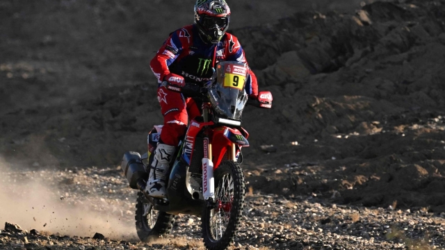 Monster Energy Honda Team's US biker Ricky Brabec competes during stage 7 between Riyad and Al Duwadimi on January 14, 2024, as part of the Dakar rally 2024. (Photo by PATRICK HERTZOG / AFP)