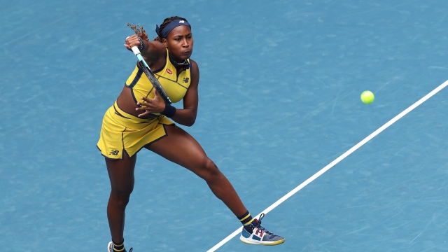 MELBOURNE, AUSTRALIA - JANUARY 19: Coco Gauff of the United States serves in their round three singles match against Alycia Parks of the United States during the 2024 Australian Open at Melbourne Park on January 19, 2024 in Melbourne, Australia. (Photo by Darrian Traynor/Getty Images)