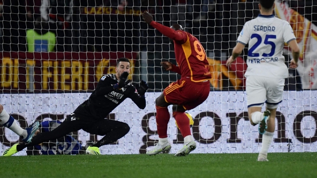 Roma's Belgian forward #90 Romelu Lukaku shoots and scores his team's first goal during the Italian Serie A football match between AS Roma and Hella Verona FC at the Olympic stadium in Rome on January 20, 2024. (Photo by Filippo MONTEFORTE / AFP)