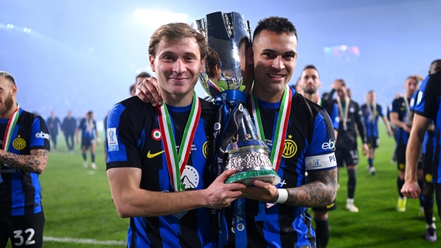 RIYADH, SAUDI ARABIA - JANUARY 22: Nicolo Barella and Lautaro Martinez of FC Internazionale pose with the trophy at the end of the Italian EA Sports FC Supercup Final match between SSC Napoli and FC Internazionale at Al-Awwal Stadium on January 22, 2024 in Riyadh, Saudi Arabia. (Photo by Mattia Ozbot - Inter/Inter via Getty Images)