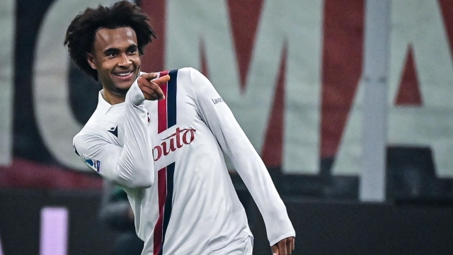 Bologna's Dutch forward #9 Joshua Zirkzee celebrates after scoring the opening goal during the Italian Serie A football match between AC Milan and Bologna at the San Siro Stadium, in Milan on January 27, 2024. (Photo by Piero CRUCIATTI / AFP)