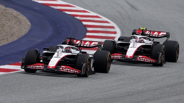 SPIELBERG, AUSTRIA - JULY 01: Kevin Magnussen of Denmark driving the (20) Haas F1 VF-23 Ferrari leads Nico Hulkenberg of Germany driving the (27) Haas F1 VF-23 Ferrari on track during the Sprint ahead of the F1 Grand Prix of Austria at Red Bull Ring on July 01, 2023 in Spielberg, Austria. (Photo by Lars Baron/Getty Images)