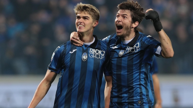 BERGAMO, ITALY - FEBRUARY 04: Charles De Ketelaere of Atalanta BC celebrates with teammate Marten De Roon after scoring the team's third goal during the Serie A TIM match between Atalanta BC and SS Lazio at Gewiss Stadium on February 04, 2024 in Bergamo, Italy. (Photo by Emilio Andreoli/Getty Images)