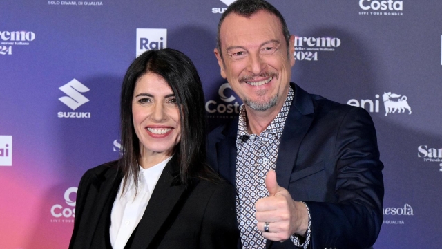 Sanremo Festival host and artistic director Amadeus (R) and Italian singer Giorgia pose during a photocall on the occasion of the 74th Sanremo Italian Song Festival, in Sanremo, Italy, 07 February 2024. The music festival will run from 06 to 10 February 2024.  ANSA/ETTORE FERRARI