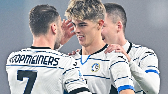 GENOA, ITALY - FEBRUARY 11: Charles De Ketelaere of Atalanta (center) celebrates with his team-mates Teun Koopmeiners and Emil Holm after scoring a goal during the Serie A TIM match between Genoa CFC and Atalanta BC - Serie A TIM at Stadio Luigi Ferraris on February 11, 2024 in Genoa, Italy. (Photo by Simone Arveda/Getty Images)