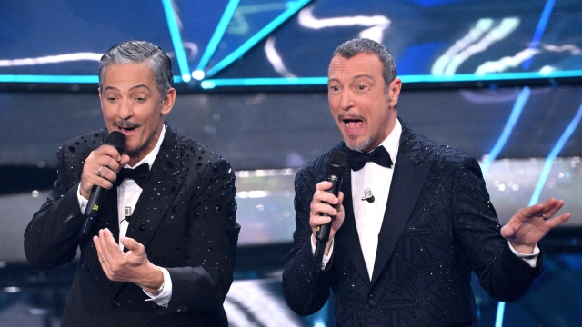 Sanremo Festival co-host and Italian showman Rosario Fiorello (L) and Sanremo Festival host and artistic director Amadeus  on stage at the Ariston theatre during the 74rd Sanremo Italian Song Festival, Sanremo, Italy, 10 February 2024. The music festival will run from 06 to 10 February 2024.  ANSA/ETTORE FERRARI