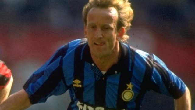 18 Apr 1992:  Roberto Donadoni (left) of AC Milan takes on Andreas Brehme of Inter Milan during a Series A match at the San Siro Stadium in Milan, Italy. AC Milan won the match 1-0. \ Mandatory Credit: Chris  Cole/Allsport