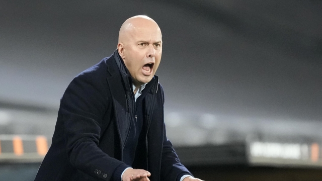 Feyenoord's head coach Arne Slot reacts to his players during the Europa League play off, first leg soccer match between Feyenoord and Roma at De Kuip stadium in Rotterdam, Netherlands, Thursday, Feb. 15, 2024. (AP Photo/Peter Dejong)