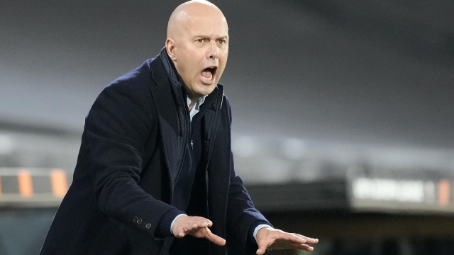 Feyenoord's head coach Arne Slot reacts to his players during the Europa League play off, first leg soccer match between Feyenoord and Roma at De Kuip stadium in Rotterdam, Netherlands, Thursday, Feb. 15, 2024. (AP Photo/Peter Dejong)
