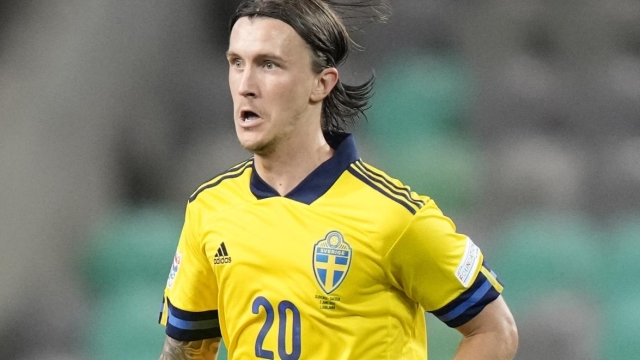 FILE - Sweden's Kristoffer Olsson is in action during the UEFA Nations League soccer match between Slovenia and Sweden at the Stozice stadium in Ljubljana, Slovenia, Thursday, June 2, 2022. Sweden midfielder Kristoffer Olsson has been hospitalized with an acute brain condition after suddenly losing consciousness at home, his Danish club FC Midtjylland said Tuesday, Feb. 27. 2024. (AP Photo/Darko Bandic, File)