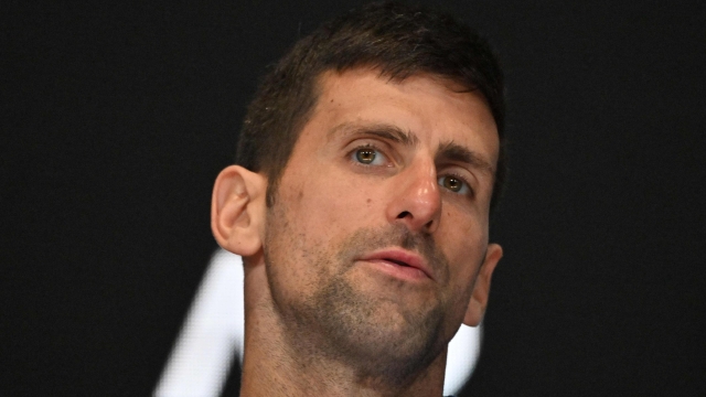 Serbia's Novak Djokovic attends a press conference after losing against Italy's Jannik Sinner in their men's singles semi-final match on day 13 of the Australian Open tennis tournament in Melbourne on January 26, 2024. (Photo by Saeed KHAN / AFP) / -- IMAGE RESTRICTED TO EDITORIAL USE - STRICTLY NO COMMERCIAL USE --