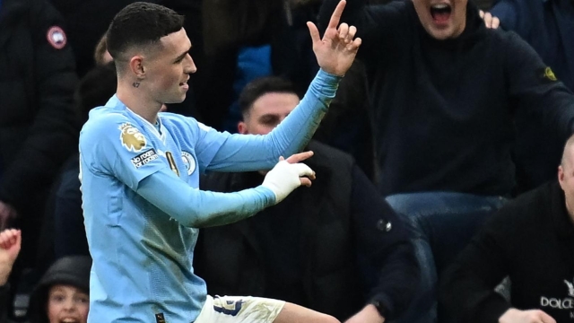 Manchester City's English midfielder #47 Phil Foden celebrates after scoring their second goal during the English Premier League football match between Manchester City and Manchester United at the Etihad Stadium in Manchester, north west England, on March 3, 2024. (Photo by Paul ELLIS / AFP) / RESTRICTED TO EDITORIAL USE. No use with unauthorized audio, video, data, fixture lists, club/league logos or 'live' services. Online in-match use limited to 120 images. An additional 40 images may be used in extra time. No video emulation. Social media in-match use limited to 120 images. An additional 40 images may be used in extra time. No use in betting publications, games or single club/league/player publications. /