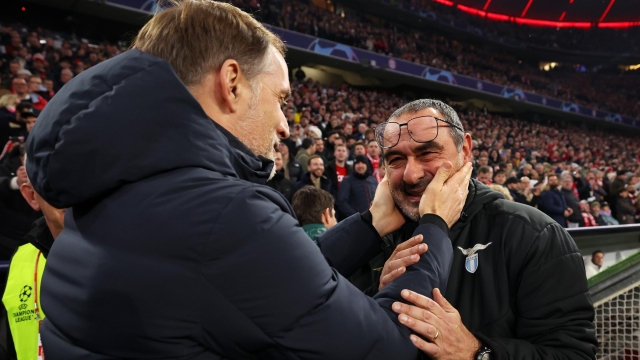 MUNICH, GERMANY - MARCH 05: Thomas Tuchel, Head Coach of Bayern Munich, and Maurizio Sarri, Head Coach of SS Lazio, interact prior to the UEFA Champions League 2023/24 round of 16 second leg match between FC Bayern München and SS Lazio at Allianz Arena on March 05, 2024 in Munich, Germany. (Photo by Alexander Hassenstein/Getty Images)