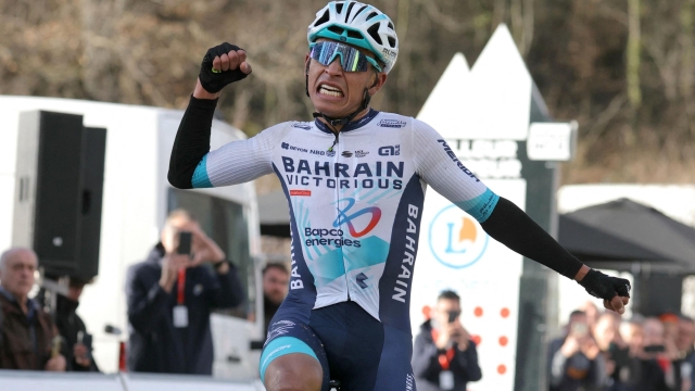 Bahrain Victorious's Colombian cyclist Santiago Buitrago celebrates as he crosses the finish line to win the 4th stage of the Paris-Nice cycling race, 183 km between Chalon-sur-Saone and Mont Brouilly, on March 6, 2024. (Photo by Thomas SAMSON / AFP)