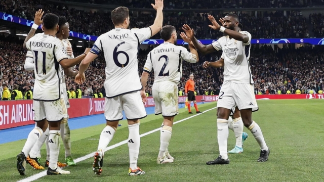 epa11202967 Real Madrid's players after scoring the 1-0 goal during the UEFA Champions League round of 16 second leg soccer match between Real Madrid and RB Leipzig in Madrid, Spain, 06 March 2024.  EPA/J.J. Guillen