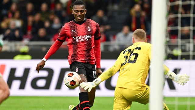 AC Milan's Portuguese forward #10 Rafael Leao (L) tries to score a goal during the UEFA Europa League match, Round of 16, 1st leg, between AC Milan and SK Slavia Prague at the San Siro Stadium in Milan on March 7, 2024. (Photo by GABRIEL BOUYS / AFP)