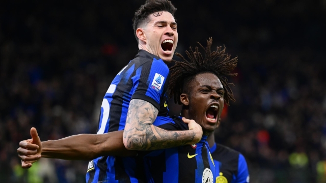 MILAN, ITALY - DECEMBER 23: Yann Aurel Bisseck of FC Internazionale celebrates after scoring his team's first goal with teammate Alessandro Bastoni during the Serie A TIM match between FC Internazionale and US Lecce at Stadio Giuseppe Meazza on December 23, 2023 in Milan, Italy. (Photo by Mattia Pistoia - Inter/Inter via Getty Images) *** BESTPIX ***