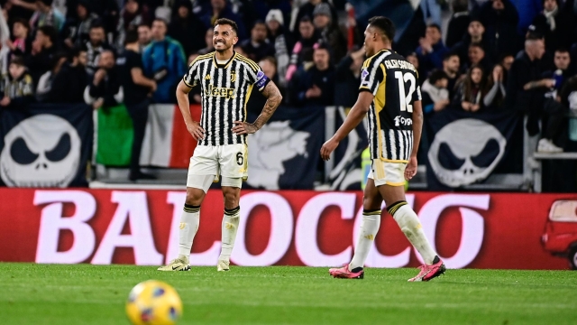 Juventus' Danilo  and Juventus' Alex Sandro  at the end of the match   during the Serie A soccer match between Juventus and Atalanta at the Allianz Stadium in Torino, north west Italy - Sunday, March 10, 2024. Sport - Soccer . (Photo by Marco Alpozzi/Lapresse)