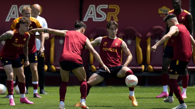 Roma's players warm up during a training session ahead of the Europa League soccer final, at the Trigoria training centre, in Rome, Tuesday, May 30, 2023. Roma will play an Europa League final against Sevilla in Budapest, Hungary, next Wednesday, May 31. (AP Photo/Alessandra Tarantino)