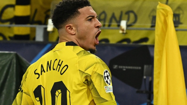 Dortmund's English midfielder #10 Jadon Sancho celebrates after scoring the opening 1-0 goal during the UEFA Champions League last 16, second-leg football match BVB Borussia Dortmund v PSV Eindhoven at the Signal Iduna stadium in Dortmund, western Germany on March 13, 2024. (Photo by INA FASSBENDER / AFP)