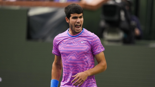 Carlos Alcaraz, of Spain, celebrates after a point against Jannik Sinner, of Italy, during a semifinal match at the BNP Paribas Open tennis tournament in Indian Wells, Calif., Friday, March 15, 2024. (AP Photo/Ryan Sun)