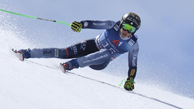 Italy's Federica Brignone speeds down the course during an alpine ski, women's World Cup super-G race, in Saalbach, Austria, Friday, March 22, 2024. (AP Photo/Marco Trovati)