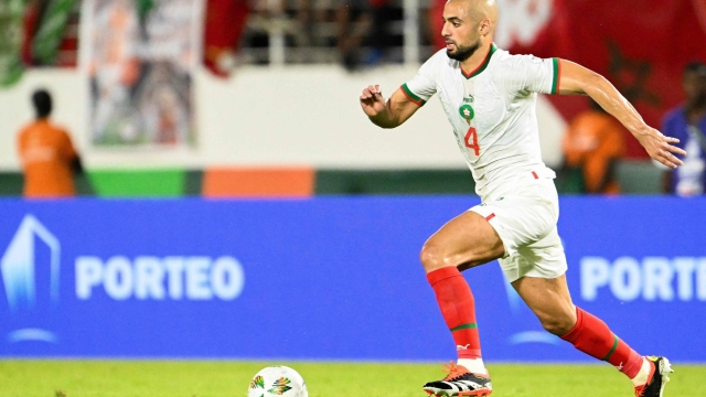 Morocco's midfielder #4 Sofyan Amrabat runs with the ball during the Africa Cup of Nations (CAN) 2024 group F football match between Zambia and Morocco at the Stade Laurent Pokou in San Pedro on January 24, 2024. (Photo by SIA KAMBOU / AFP)