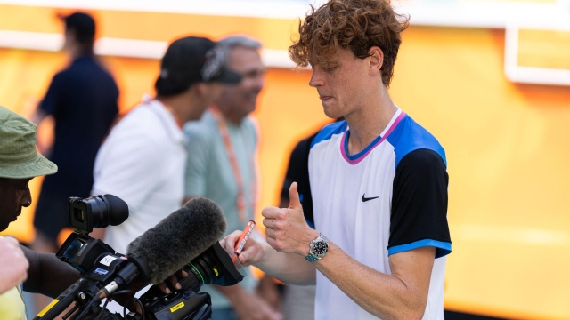 MIAMI GARDENS, FLORIDA - MARCH 31: Jannik Sinner of Italy celebrates by signing the camera after defeating Grigor Dimitrov of Bulgaria 6-3, 6-1 in the men's final of the Miami Open at Hard Rock Stadium on March 31, 2024 in Miami Gardens, Florida.   Brennan Asplen/Getty Images/AFP (Photo by Brennan Asplen / GETTY IMAGES NORTH AMERICA / Getty Images via AFP)
