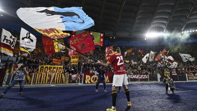 RomaÕs Gianluca Mancini celebrates the victory during the Serie A soccer match between AS Roma and SS Lazio at the Olimpico stadium in Rome, Italy, 6 April 2024. ANSA/RICCARDO ANTIMIANI