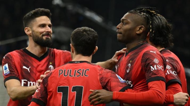 MILAN, ITALY - FEBRUARY 25:  Rafael Leao of AC Milan celebrates with team-mates after scoring the goal during the Serie A TIM match between AC Milan and Atalanta BC at Stadio Giuseppe Meazza on February 25, 2024 in Milan, Italy. (Photo by Claudio Villa/AC Milan via Getty Images)