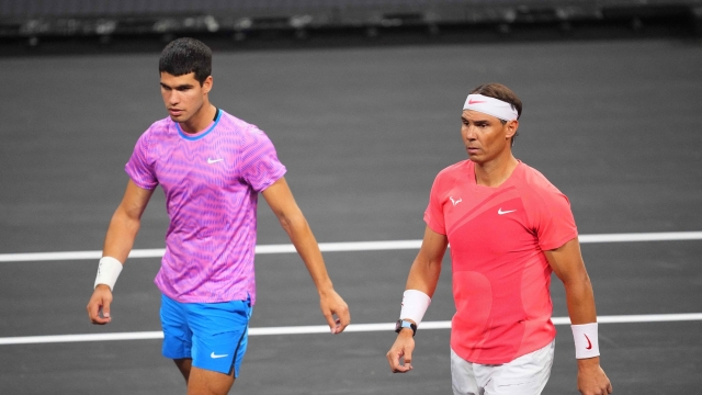 LAS VEGAS, NEVADA - MARCH 03: (L-R) Carlos Alcaraz and Rafael Nadal in action during The Netflix Slam at Michelob ULTRA Arena on March 03, 2024 in Las Vegas, Nevada.   Chris Unger/Getty Images/AFP (Photo by Chris Unger / GETTY IMAGES NORTH AMERICA / Getty Images via AFP)