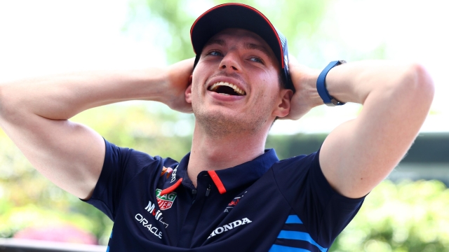 SHANGHAI, CHINA - APRIL 18: Max Verstappen of the Netherlands and Oracle Red Bull Racing laughs in the Paddock during previews ahead of the F1 Grand Prix of China at Shanghai International Circuit on April 18, 2024 in Shanghai, China. (Photo by Mark Thompson/Getty Images)