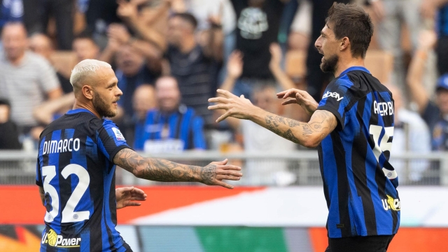 Inter Milan's Francesco Acerbi (R) jubilates with his teammate Federico Dimarco after scoring goal of 1 to 0 during the Italian serie A soccer match between Fc Inter  and Bologna Giuseppe Meazza stadium in Milan, 7 October 2023. ANSA / MATTEO BAZZI