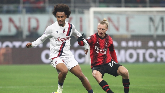 MILAN, ITALY - JANUARY 27: Joshua Zirkzee of Bologna FC and Simon Kjaer of AC Milan battle for the ball during the Serie A TIM match between AC Milan and Bologna FC - Serie A TIM  at Stadio Giuseppe Meazza on January 27, 2024 in Milan, Italy. (Photo by Marco Luzzani/Getty Images)