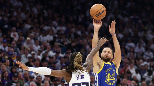 SACRAMENTO, CALIFORNIA - APRIL 16: Stephen Curry #30 of the Golden State Warriors shoots over Keon Ellis #23 of the Sacramento Kings in the first quarter during the Play-In Tournament at Golden 1 Center on April 16, 2024 in Sacramento, California. NOTE TO USER: User expressly acknowledges and agrees that, by downloading and or using this photograph, User is consenting to the terms and conditions of the Getty Images License Agreement.   Ezra Shaw/Getty Images/AFP (Photo by EZRA SHAW / GETTY IMAGES NORTH AMERICA / Getty Images via AFP)