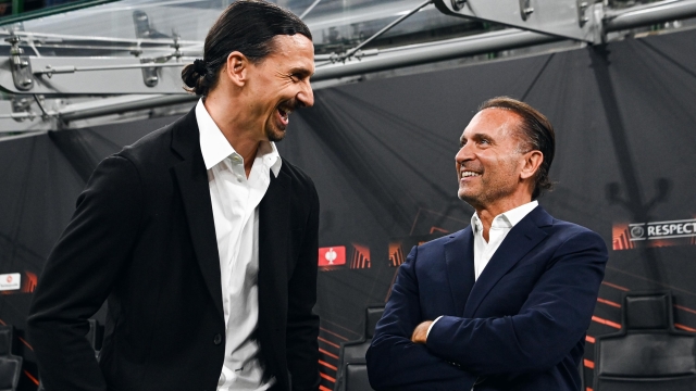 MILAN, ITALY - APRIL 11: Founder and Managing Partner of RedBird Gerry Cardinale talks with Zlatan Ibrahimovic during the UEFA Europa League 2023/24 Quarter-Final first leg match between AC Milan and AS Roma at Stadio Giuseppe Meazza on April 11, 2024 in Milan, Italy. (Photo by Daniele Venturelli - AC Milan/AC Milan via Getty Images)