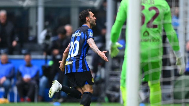 MILAN, ITALY - APRIL 28:  Hakan Calhanoglu of FC Internazionale celebrates after scoring the goal during the Serie A TIM match between FC Internazionale and Torino FC at Stadio Giuseppe Meazza on April 28, 2024 in Milan, Italy. (Photo by Mattia Pistoia - Inter/Inter via Getty Images) (Photo by Mattia Pistoia - Inter/Inter via Getty Images)