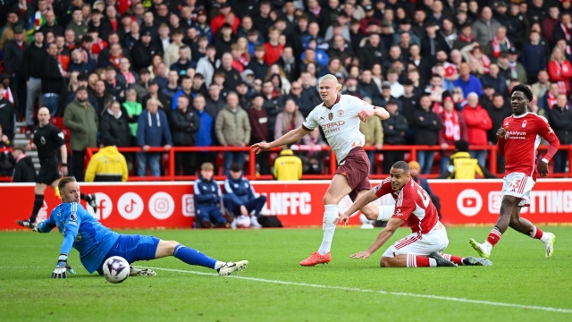 MANCHESTER, ENGLAND - APRIL 27: Erling Haaland of Manchester City scores to make it 2-0 during the Premier League match between Manchester United and Burnley FC at Old Trafford on April 27, 2024 in Manchester, England. (Photo by Michael Regan/Getty Images) (Photo by Michael Regan/Getty Images)